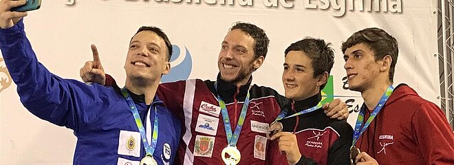 Selfie de Nicolas com colegas de equipe