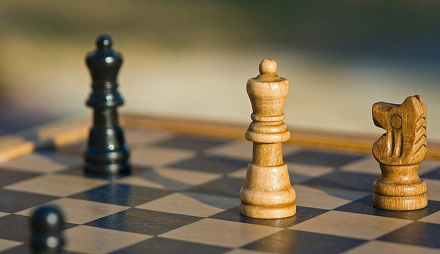 Tabuleiro de xadrez com suas peças.