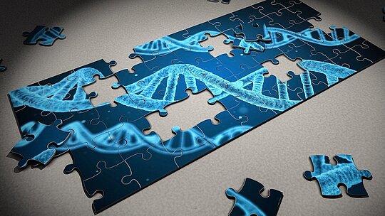 imagem de um quebra-cabeça semimontado com o desenho de um DNA em tons azuis